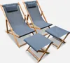 Two grey deck chairs and two matching footrests are arranged on a white background. Produktbild-Vorschau