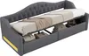 A gray upholstered daybed with its mattress pulled back to reveal storage compartments underneath. A beige blanket is draped over the mattress. Anteprima dell’immagine prodotto
