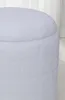 A close-up view of a white, textured ottoman or pouf. Náhled obrázku produktu