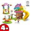 A colorful LEGO playset featuring a treehouse with a slide, a swing set, a carousel, and figures. Produktbild-Vorschau