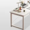 A white desk with a laptop, lamp, books, and a cup of coffee. Podgląd zdjęcia produktu