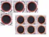 A collage of circular tire patches on a silver backing. Produktbild-Vorschau