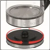 A close-up shot of a glass electric kettle base being attached to its power cord. Produktbild-Vorschau