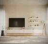 A modern living room setup with a TV stand and shelves. Náhľad obrázku produktu