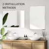 A modern bathroom vanity with two sinks and two frameless mirrors, showcasing different installation methods. Produktbild-Vorschau