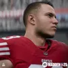 A close-up of a virtual football player in a red uniform. Podgląd zdjęcia produktu
