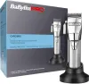 A box and two chrome hair clippers on charging stands. Anteprima dell’immagine prodotto