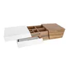 A modern coffee table with white and wood finishes, featuring open and closed storage compartments. Náhľad obrázku produktu