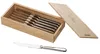 A set of six steak knives in a wooden box, with one knife placed in front of the box. Produktbild-Vorschau