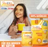 A woman is in bed, holding a mug, with a product box and bottle in the foreground. Produktbild-Vorschau