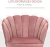 A close-up of a pink velvet chair with a scalloped backrest, with marketing text above. Náhľad obrázku produktu