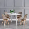 A dining set with a square table and four chairs in a room with gray paneled walls. Produktbild-Vorschau
