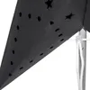 Close-up view of a black paper star lamp with small holes and cut-out stars, attached to a stand with a white string. Produktbild-Vorschau
