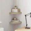 Two corner shelves mounted on a wall, with decorative items on them. Náhled obrázku produktu