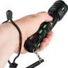 A hand holding a black flashlight with green accents. Produktbild-Vorschau
