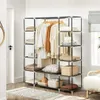 A portable wardrobe filled with clothes and folded items, set up in a room. Náhľad obrázku produktu