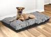 A dog is lying on a dog bed in a room. Voir les images du produit