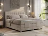 A bedroom scene featuring a beige boxspring bed. Produktbild-Vorschau