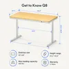 A diagram of a standing desk with dimensions and feature callouts. Produktbild-Vorschau