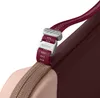 A close-up view of a strap and buckle mechanism on a bag. Produktbild-Vorschau