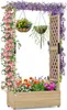A wooden raised garden bed with an archway covered in flowers and vines, featuring hanging baskets. Produktbild-Vorschau