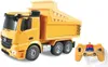 A yellow remote-controlled dump truck and its remote control are shown against a white background. Náhľad obrázku produktu