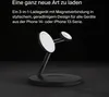 A black 3-in-1 wireless charger with magnetic connection for iPhones and Apple Watches, shown on a dark surface against a black background. Podgląd zdjęcia produktu