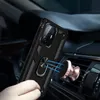 A hand holding a black phone case with a ring holder, attached to a magnetic car mount on an air vent. Produktbild-Vorschau