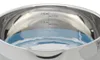 Close-up of the inside of a stainless steel pot with water and measurement markings. Podgląd zdjęcia produktu