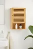 A wooden bathroom cabinet mounted on a tiled wall. Produktbild-Vorschau