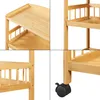 A collage of four close-up images of a bamboo serving cart. Voir les images du produit