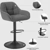 A dark gray bar stool with callouts highlighting its features. Produktbild-Vorschau