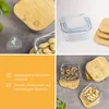 A collage of images showcasing glass food storage containers with bamboo lids, some filled with food items like peanuts and spices, and text highlighting product features. Produktbild-Vorschau