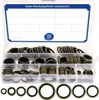 A clear, well-lit image of a plastic organizer box filled with various sizes of rubber and metal sealing washers. The box is open, showing multiple compartments containing stacks of washers. A few washers are also displayed in a row at the bottom of the im Náhled obrázku produktu