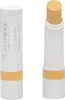 A product shot of a concealer stick and its packaging, presented against a white background. Produktbild-Vorschau