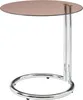 A round side table with a brown glass top and a chrome base. Anteprima dell’immagine prodotto