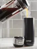 Coffee being poured from a French press into a Contigo thermobecher. Anteprima dell’immagine prodotto