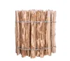 A section of a rustic wooden fence made of pointed stakes bound together with wire. Produktbild-Vorschau