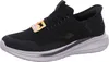 A black Skechers shoe is shown from the side against a white background. Anteprima dell’immagine prodotto
