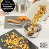 Chopped vegetables being transferred from a cutting board to a mixing bowl. Produktbild-Vorschau