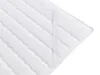 A close-up, angled view of a white quilted mattress topper with elastic straps visible. Náhled obrázku produktu