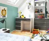 A child's bedroom with a desk, shelves, and a bed. Produktbild-Vorschau
