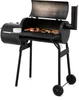 A black smoker-grill with the lid open, showing food on the grill. Produktbild-Vorschau