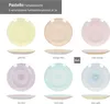 A collage of six different colored plates, each shown from the top and side view, with their color combinations labeled. Voir les images du produit