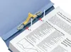 A close-up shot of a blue file folder with a document filing mechanism and text. Anteprima dell’immagine prodotto
