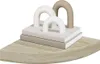 Decorative bookends with arched shapes on top of books, placed on a shelf. Náhled obrázku produktu