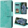 A collage of images showing a teal flip phone case with a mandala design, including a view of the case open with cards and a photo, and a view of the phone inside the case. Produktbild-Vorschau