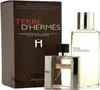 A product shot of Hermès Terre D'hermes perfume, featuring both the boxed set and individual bottles. Podgląd zdjęcia produktu