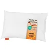 A white pillow with a tag attached. Produktbild-Vorschau