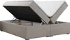 A bed frame with the mattress lifted, revealing storage space underneath. Produktbild-Vorschau